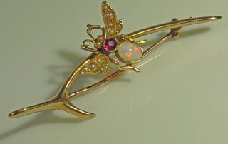Gold Wishbone and Fly Brooch