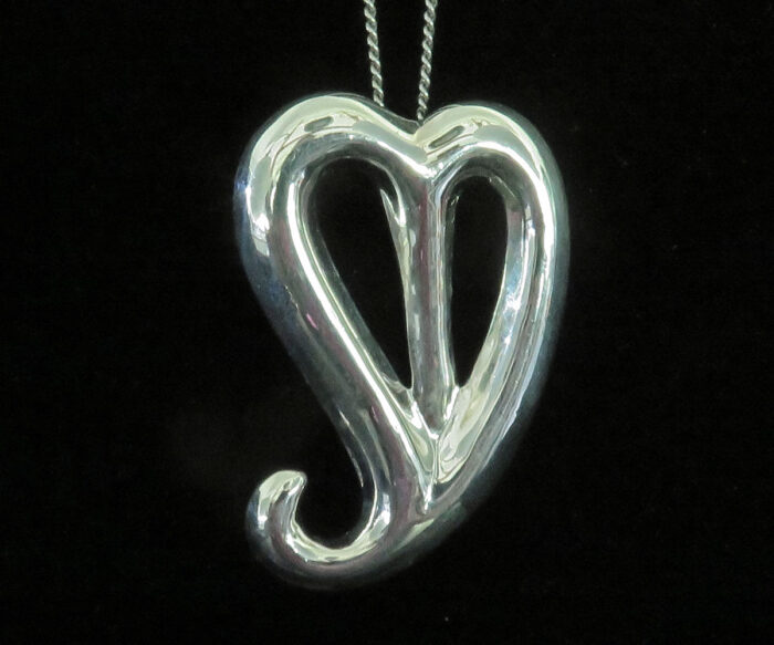 Sterling Heart Pendant with a Tail
