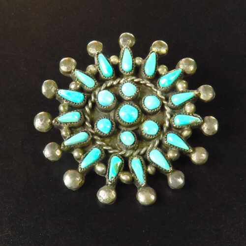 Sweet circular sterling Navajo pin with handset turquoise from the 50's.