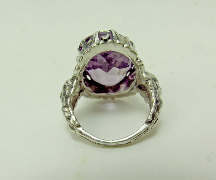 Sterling Amethyst Ring with Grotesque Faces