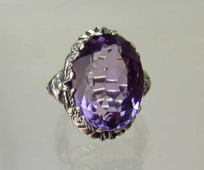 Sterling Amethyst Ring with Grotesque Faces